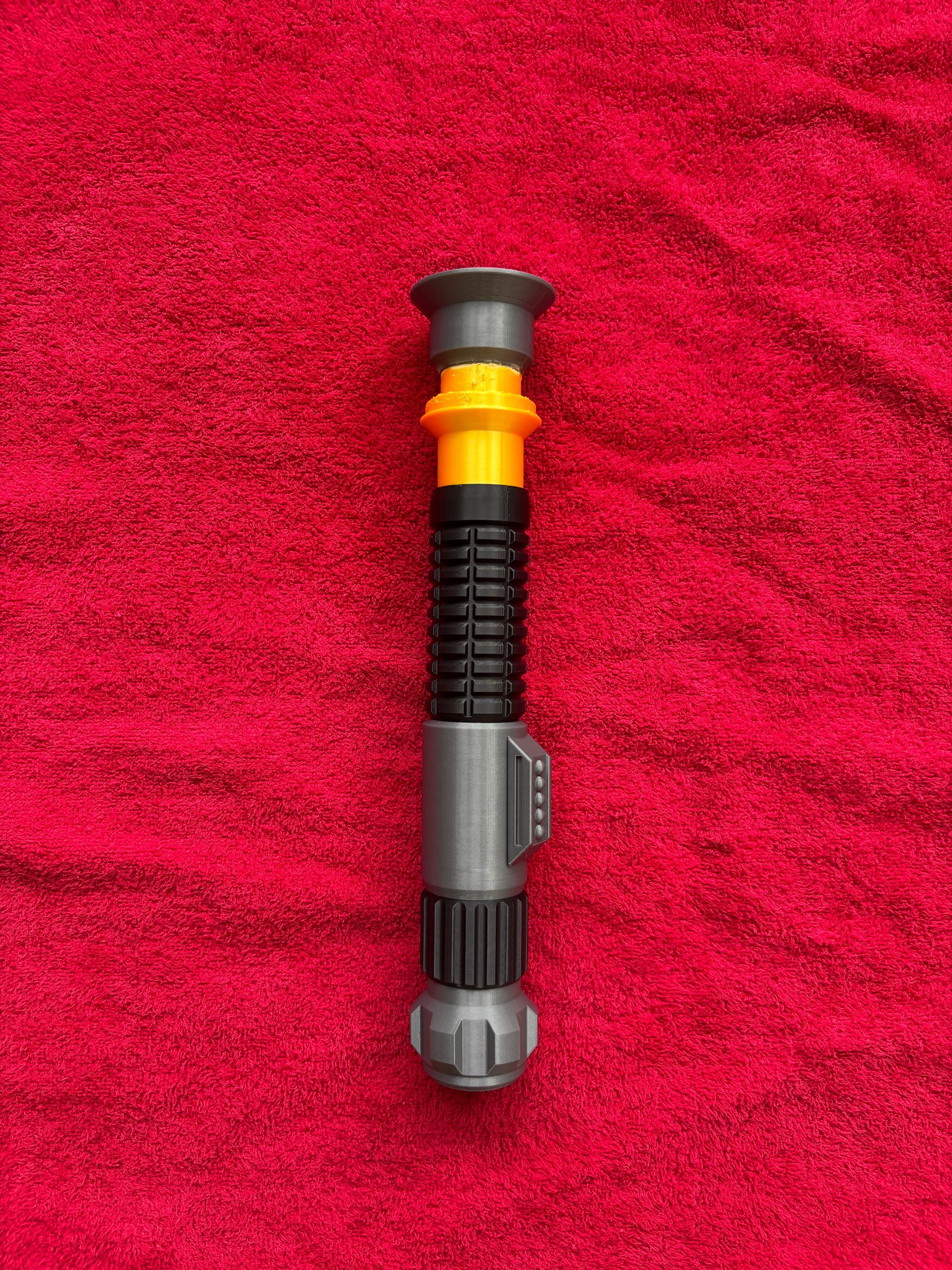 3D Printed Obi Wan Lightsaber Prop With Collapsible Blade and Gold Accents
