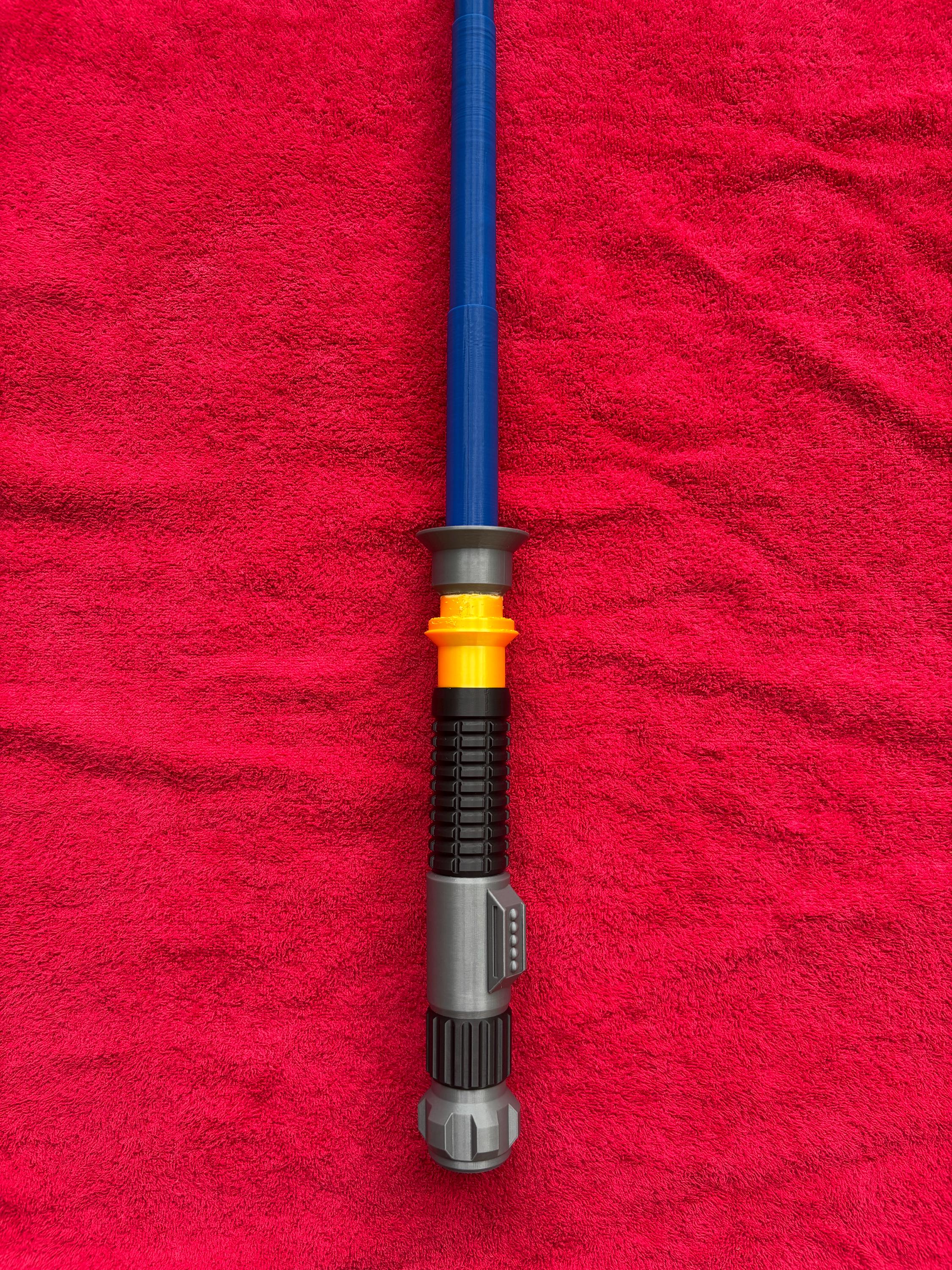 3D Printed Obi Wan Lightsaber Prop With Collapsible Blade and Gold Accents